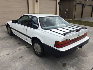 Illustration for article titled For $4,000, This 1988 Honda Prelude S Tells Your Luggage To Rack ‘Em Up